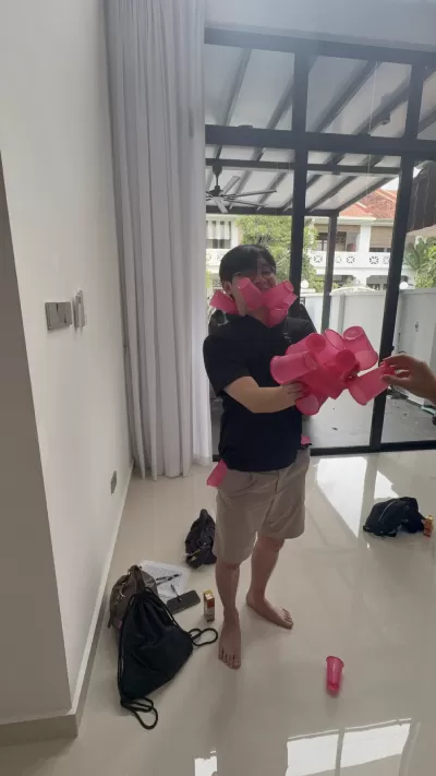 Stuff as many cups as possible onto one teammate without stacking them.